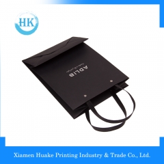Professionelles preiswertes Einkaufen billig nett aussehende süße schwarze Geschenkpapiertüte Huake Printing